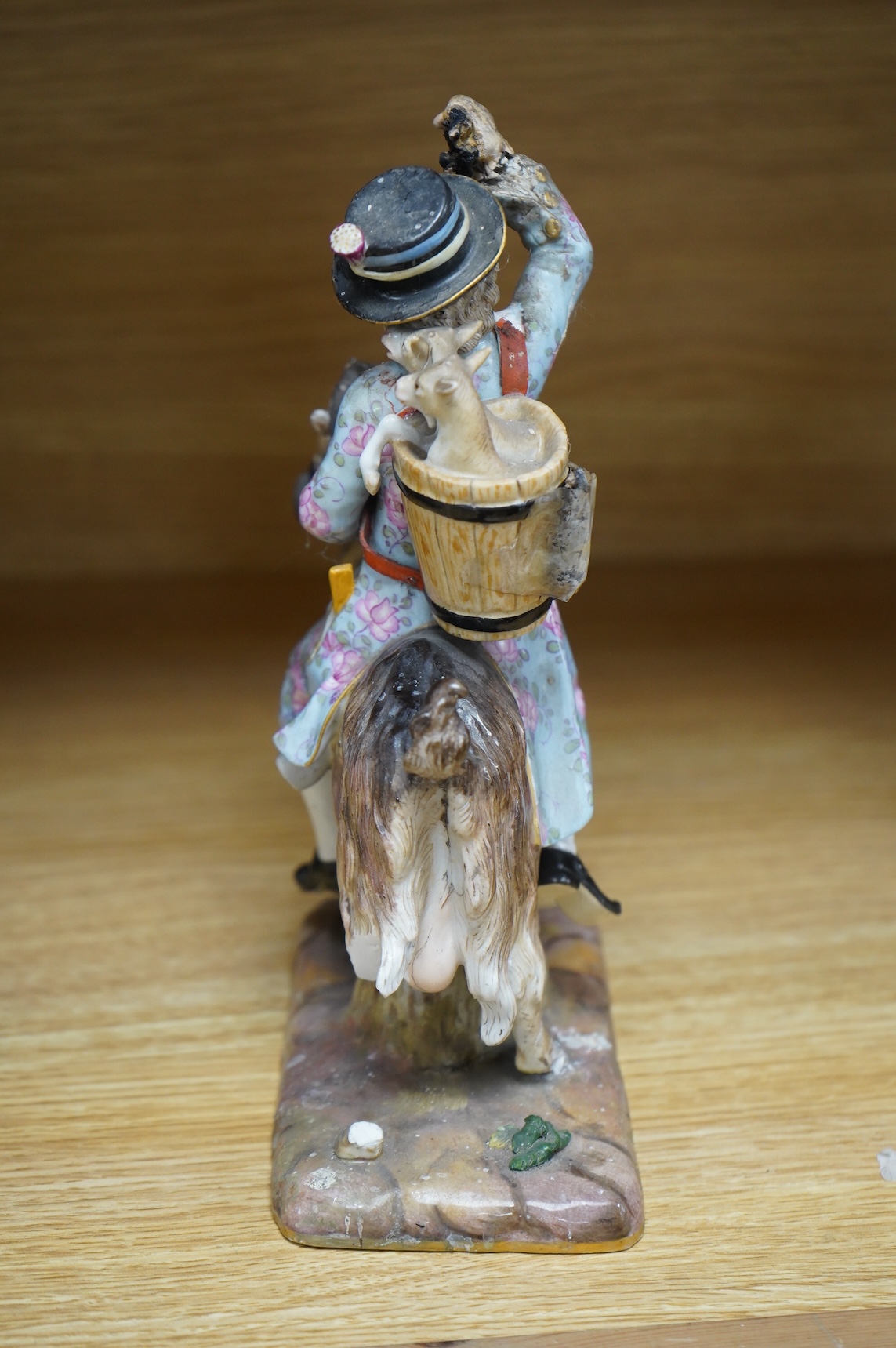 A Meissen figure of Count Bruhl's Tailor, after the model by J J Kändler, incised model number 171, 22cm